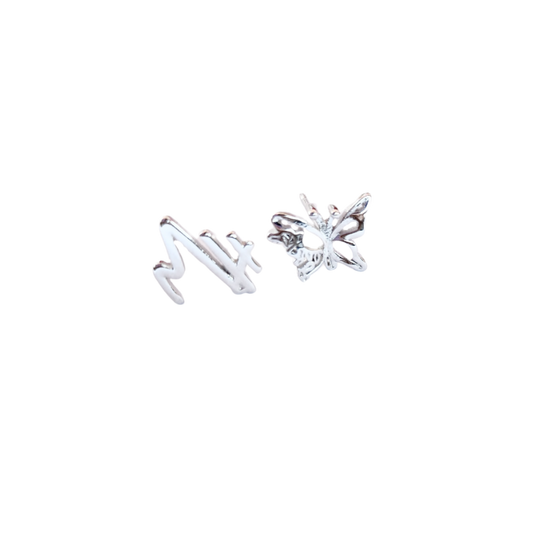 Wings of Strength asymmetric butterfly stud earrings in sterling silver — Mel Style